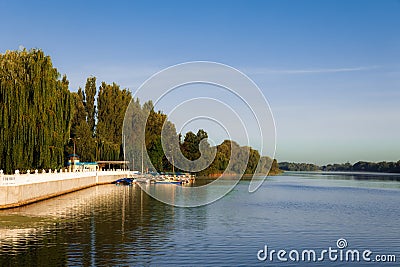 ordinary river waterfront outskirts pier walking peaceful area landscape in the morning Stock Photo