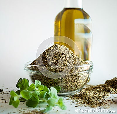 Oregano spices and olive oil Stock Photo
