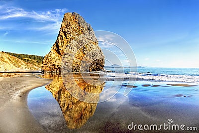 Oregon Pacific Coast, Amazing Rock Reflection Ocean Stock Photo