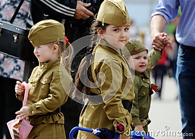 Orel, Russia, May 09, 2019: Victory Day, Immortal Regiment parade. Little children in WWII soldiers uniform walking in the street Editorial Stock Photo