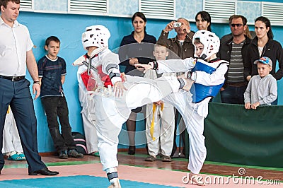 Orenburg, Russia - 23 April 2016: The boys compete in Taekwondo Editorial Stock Photo