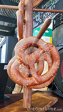 Traditional Bavarian salty pretzels in private brewery cafe Editorial Stock Photo