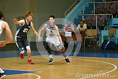 Orenburg, Russia - 13-16 June 2019 year: Men play basketball Editorial Stock Photo