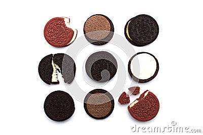 Oreo cookies and cream in pieces of outside and inside crust on white with sweet cream, Chocolate, Peanut butter and R Editorial Stock Photo