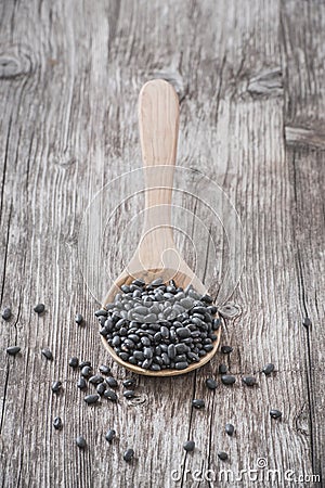 Organic adzuki beans on a wooden spoon Stock Photo