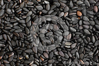 Organic black Sesame seeds in high close up. Stock Photo