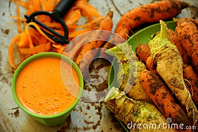 Organic carrots and carrot juice for a healthy breakfast Stock Photo