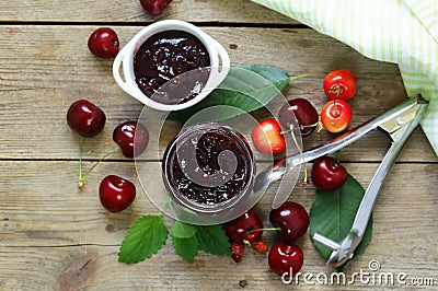 Organic cherry jam with fresh berries Stock Photo