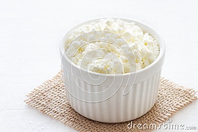 Organic cottage cheese in bowl Stock Photo
