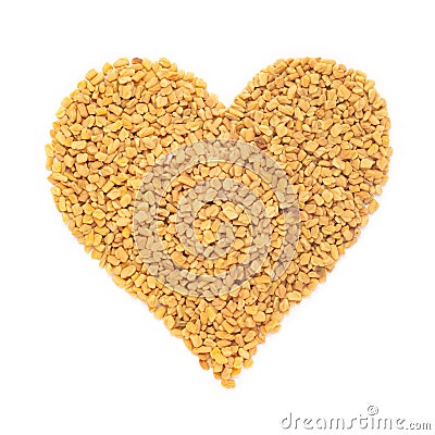 Organic Fenugreek seed Trigonella foenum-graecum in Heart Shape. Stock Photo