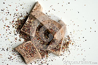 Organic fruit tea and chocolate on white table Stock Photo