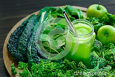 Organic Green Juice with Leafy Green Vegetables Stock Photo