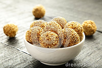 Vegan snack Sesame seed jaggery balls . Stock Photo