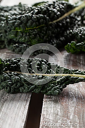 Organic Lacinato Kale brown table Stock Photo