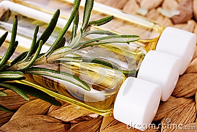Organic oil with rosemary closeup Stock Photo