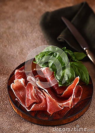 organic parma ham dry cured jamon Stock Photo