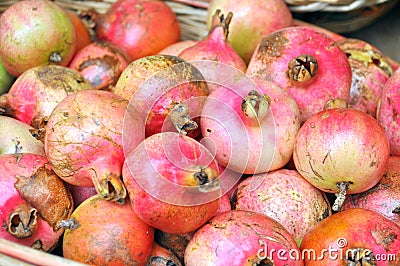 Organic pomegranate fruit on sale in Italy Stock Photo