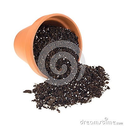 Organic potting soil spilling from cay pot Stock Photo