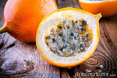 Organic raw ripe yellow granadilla passion fruit Stock Photo