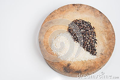 Organic rice grain,brown rice in heart shape isolate on white with cli[pping path Stock Photo
