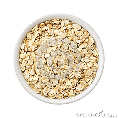 Organic Rolled Oats in a ceramic bowl Stock Photo