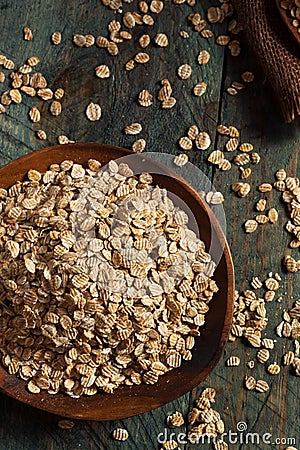 Organic Rolled Rye Flakes Stock Photo