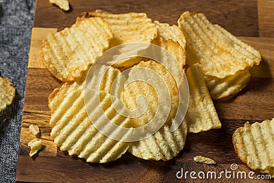 Organic Salted Wavy Potato Chips Stock Photo