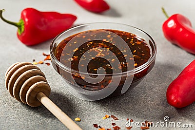 Organic Spicy Hot Honey Chili Crunch Stock Photo