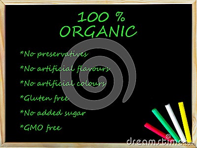100% organic text on blackboard Stock Photo