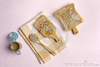 Organic toast bread with healthy organic sunflower seed butter flat lay Stock Photo