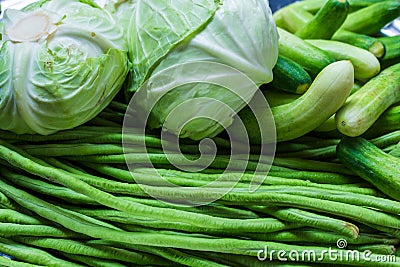 Organic vegetables, cabbage, cucumbers, long beans from the garden Stock Photo