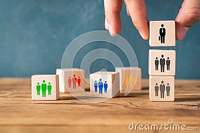 Organization and team structure symbolized with cubes Stock Photo