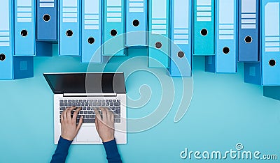 Searching files in the archive using a laptop Stock Photo