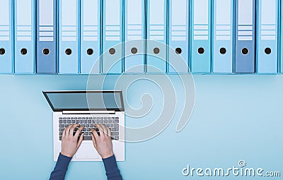 Searching files in the archive using a laptop Stock Photo