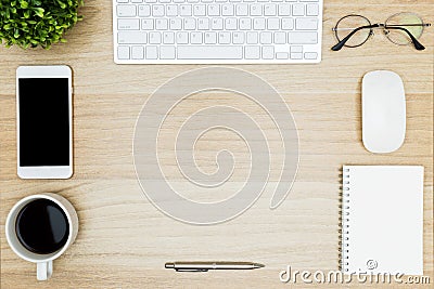 Organized and clean wood desk table with a lot of things on it. Stock Photo