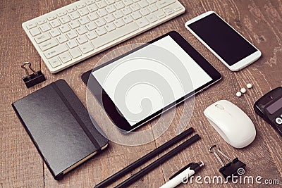 Organized office objects on table. Digital tablet mock up Stock Photo