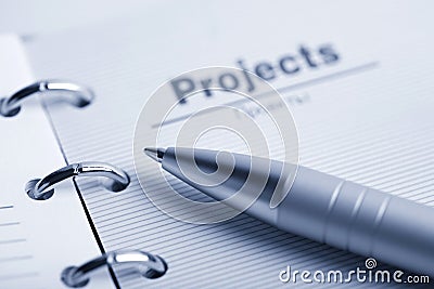 Organizer and pen. buisness background Stock Photo