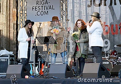 Organizers of 75th Anniversary of John Lennon festival in Riga Editorial Stock Photo