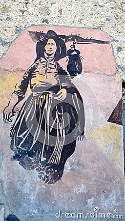 ORGOSOLO ITALY 4 October 2015 Murales in Orgosolo Italy Since about 1969 the wall paintings reflect different aspects of Sardinia Editorial Stock Photo