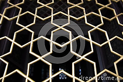 Oriental antique window grills with a star pattern Stock Photo