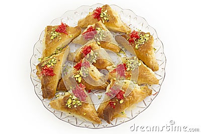 Oriental Arabic sweet warbat with qishta, kadayif, kunafa, with pistachio and cheese Stock Photo