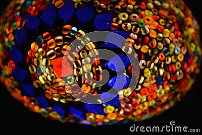 Oriental beauty, color mosaic with different colors. Magic lamp with inlaid stones. Stock Photo