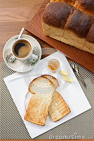 oriental breakfast set in Malaysia consisting of toast bread and coffee Stock Photo