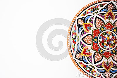 Oriental ceramic plate with beautiful colorful ornament Stock Photo