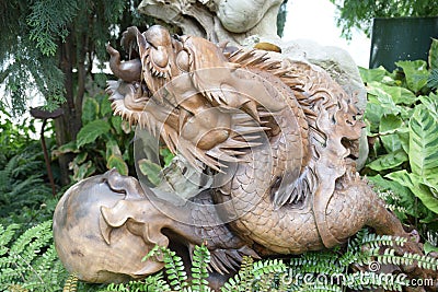 An Oriental Dragon sculpture statue at Singapore Gardens by the Bay Cloud Forest observatory Editorial Stock Photo