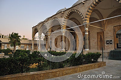 Oriental garden and madrasah Stock Photo