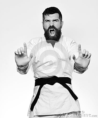 Oriental sports concept. Jiu Jitsu master with black belt Stock Photo