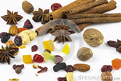 Oriental sweets, nuts, anise stars, cinnamon isolated on a white background Stock Photo