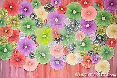 Origami color paper look like circle blow or fan to decorated wall. Stock Photo