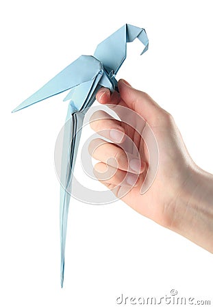 Origami parrot on hand Stock Photo